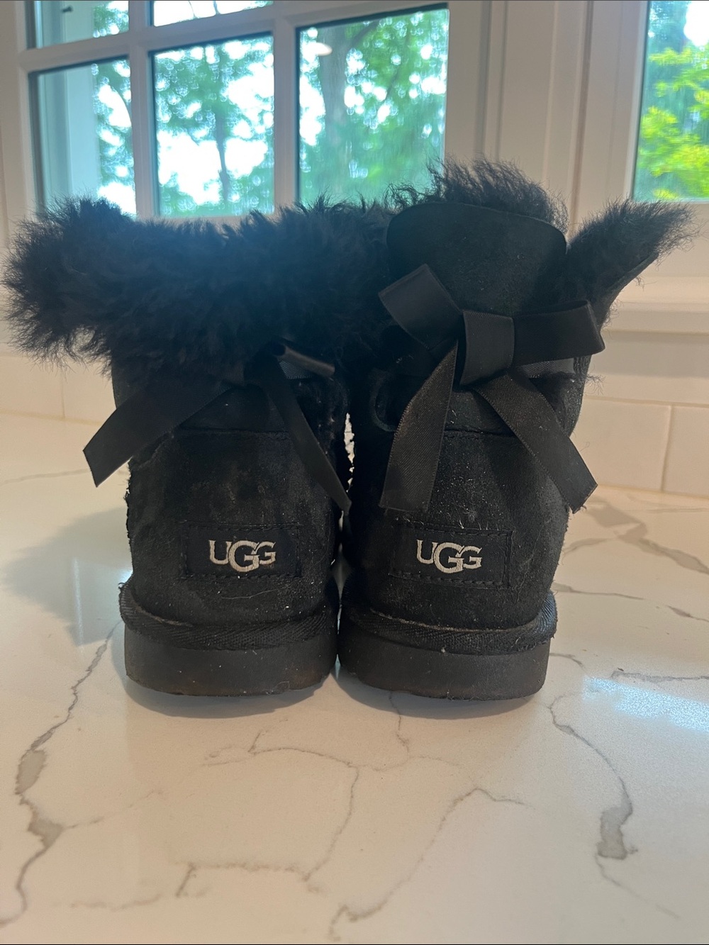 Black bow Uggs kids